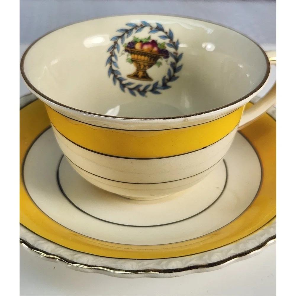 Yellow Myott Staffordshire Urn and Fruit Teacup And Saucer 1940